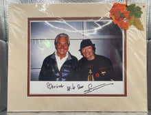 Load image into Gallery viewer, Peter Nygard & George Hamilton Signed Autographed Matted Photo To "Bevins"