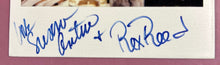 Load image into Gallery viewer, Vintage 1980 Susan Anton & Rex Reed Autographed Polaroid Photograph
