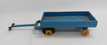Load image into Gallery viewer, Vintage Blue Pull Wagon, Dinky Toys, Made in England, approx. 3 1/2" L