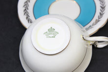 Load image into Gallery viewer, Blue, Gold Trim Aynsley Bone China Cup and Saucer w/ Flower Bouquet Center
