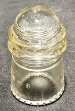 Load image into Gallery viewer, Vintage Dominion - 9 Glass Telegraph Insulator