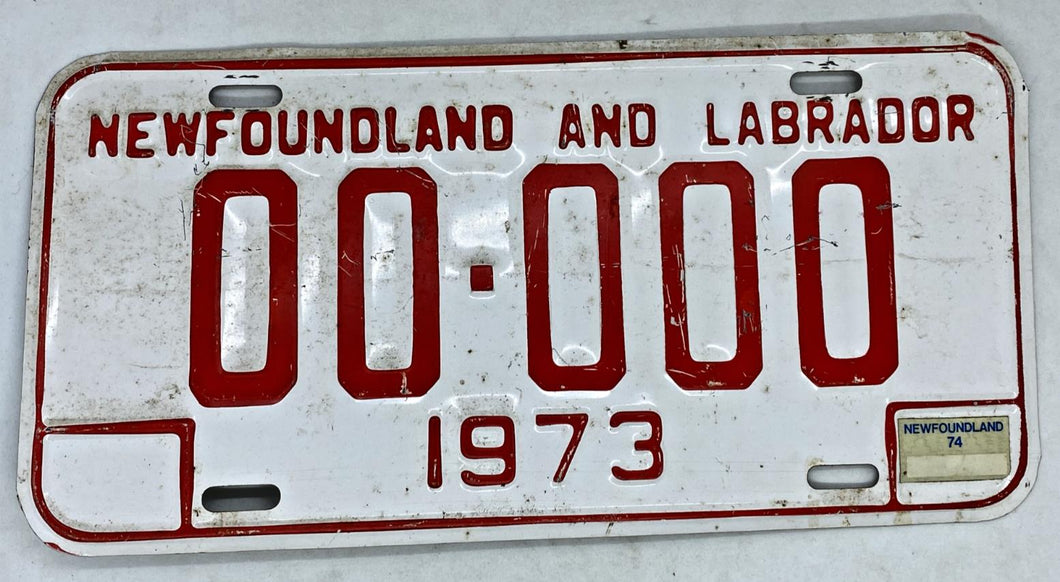 1973 Newfoundland and Labrador Sample License Plate w/ Sticker