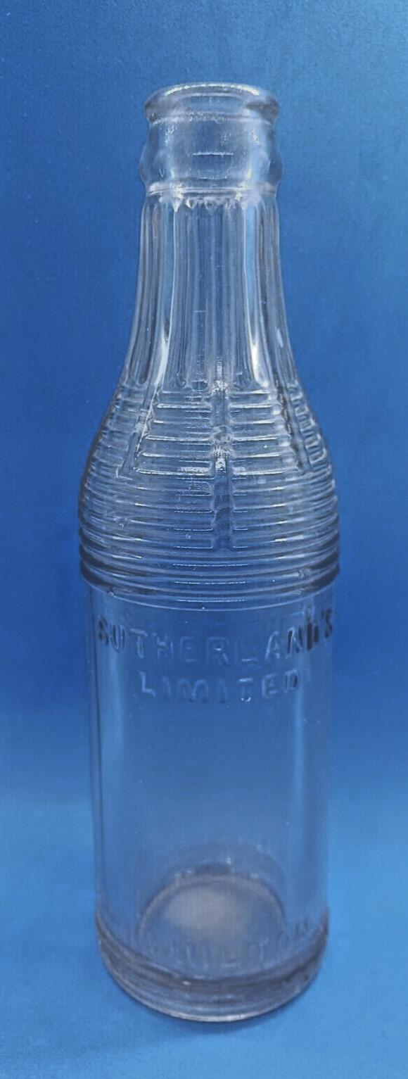 Sutherland's Limited Hamilton Contents 6 1/2 FLD OZS Glass Bottle