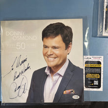 Load image into Gallery viewer, Donny Osmond Signed 2015 Fifty 50 Years Commemorative Calendar JSA COA
