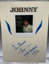 Load image into Gallery viewer, Johnny Mathis Signed Type-1 Polaroid Photo in  8 x 10 Album Page Dated 6/9/82
