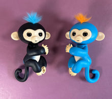 Load image into Gallery viewer, WowWee Fingerlings Interactive Baby Monkeys Lot of 2 - Finn (Black) &amp; Boris
