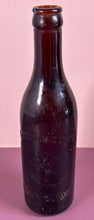 Load image into Gallery viewer, Antique c.1900 McDonach &amp; Shea Winnipeg Embossed Amber Beer Bottle
