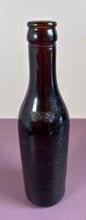 Load image into Gallery viewer, Antique c.1900 McDonach &amp; Shea Winnipeg Embossed Amber Beer Bottle
