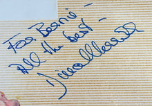 Load image into Gallery viewer, Dina Merrill Autographed Type-1 Polaroid Photo on Scrapbook Page
