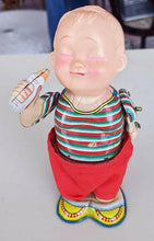 Load image into Gallery viewer, Vintage Metal Wind-Up Toy - baby Drinking &amp; Pulling Down Pants - Works!
