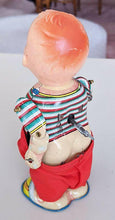 Load image into Gallery viewer, Vintage Metal Wind-Up Toy - baby Drinking &amp; Pulling Down Pants - Works!
