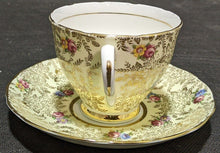 Load image into Gallery viewer, Colclough Bone China Tea Cup &amp; Saucer -- Heavy Gold Detail With Flowers
