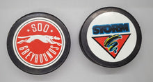 Load image into Gallery viewer, Hockey Pucks Lot - Sault Ste. Marie Greyhounds &amp; Guelph Storm
