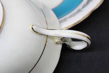 Load image into Gallery viewer, Blue, Gold Trim Aynsley Bone China Cup and Saucer w/ Flower Bouquet Center
