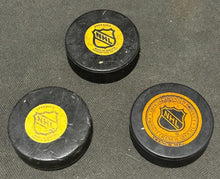 Load image into Gallery viewer, NHL Hockey Viceroy Maple Leaf&#39;s 2 game pucks and Trench Maple Leaf&#39;s, EX+
