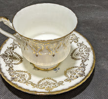 Load image into Gallery viewer, Paragon Tea Cup &amp; Saucer White, Floral &amp; Gold
