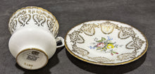 Load image into Gallery viewer, Paragon Tea Cup &amp; Saucer White, Floral &amp; Gold
